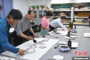 问卦求签两岸艺术家在安徽“共绘一幅画”